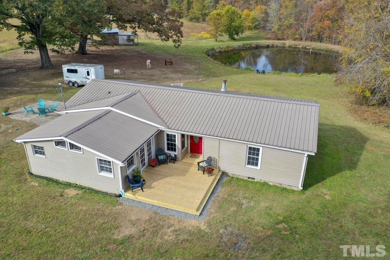 1231 Stoney Mountain Road Rougemont, NC 27572 - Photo 4 of 45 an aerial view of a house having yard