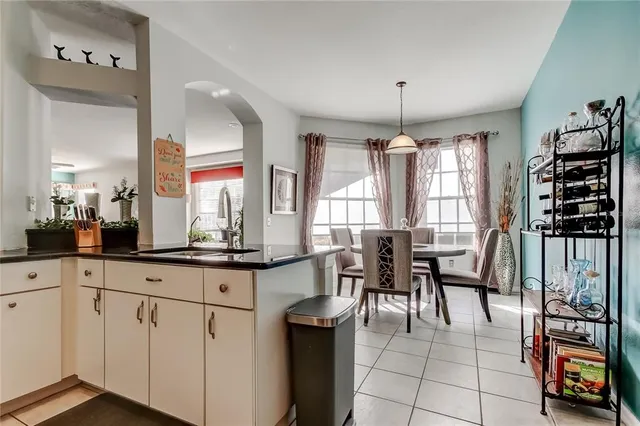 a view of walk in closet with clothes