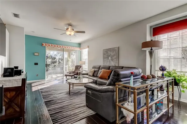 a bedroom with a bed and a flat tv screen