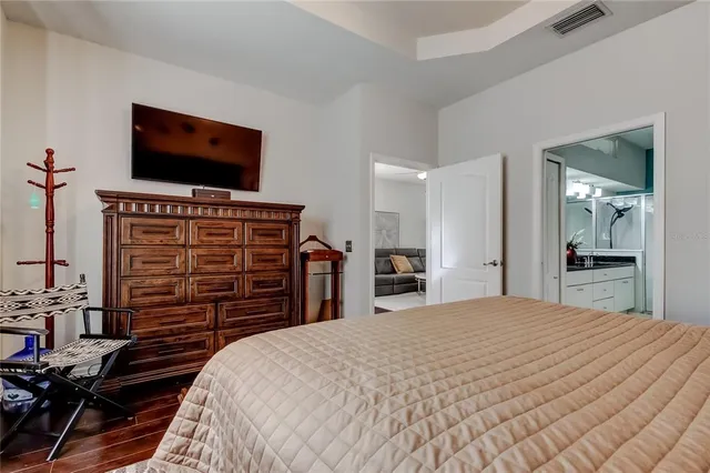 a view of a patio with table and chairs and potted plants