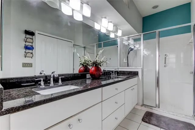 a view of a glass door with a tree