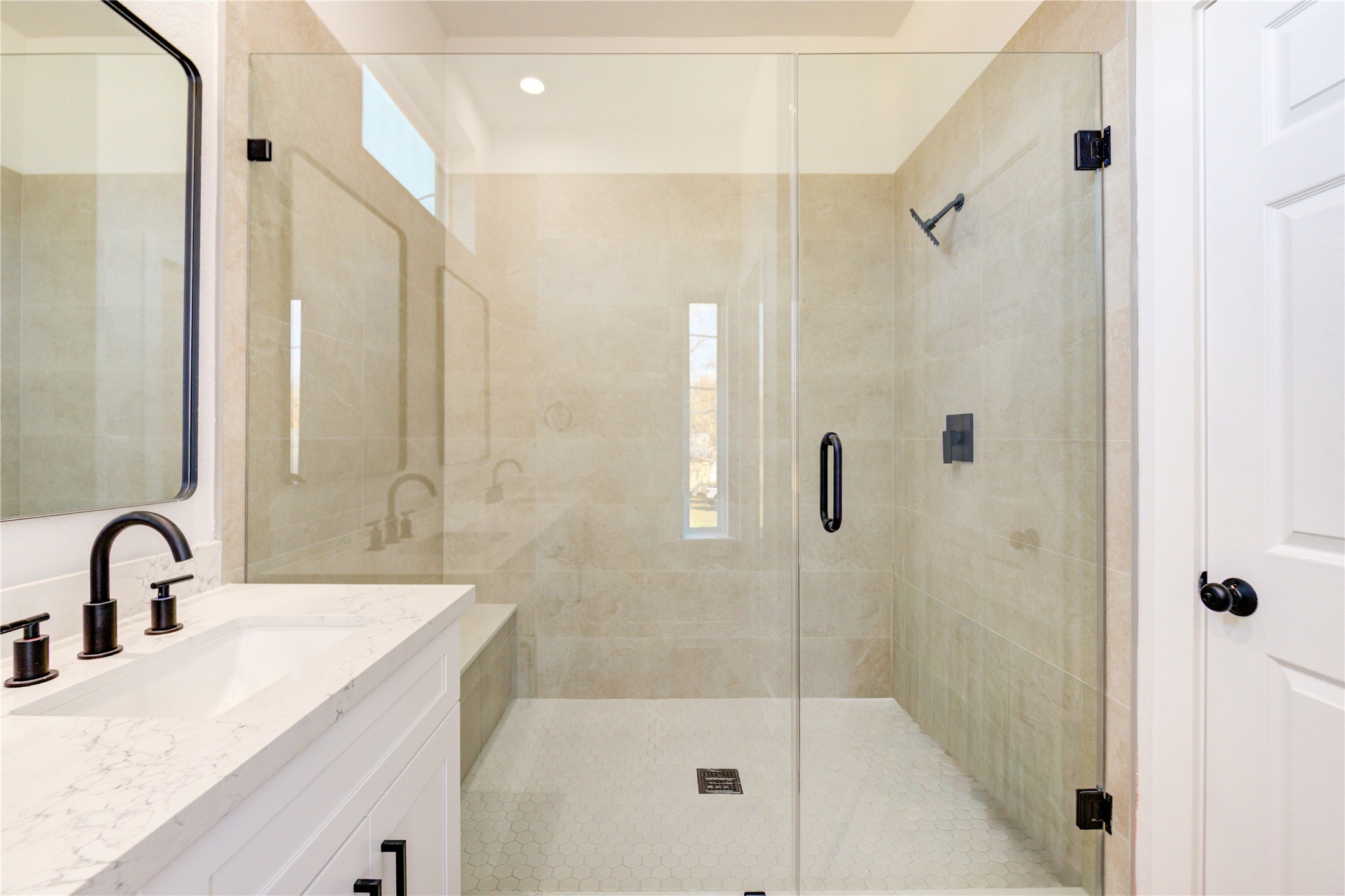 1211 Dewalt Street Houston, TX 77088 - Photo 12 of 28 a bathroom with a sink and a mirror