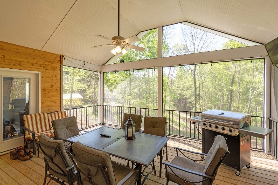 128 Murrell Road Dickson, TN 37055 - Photo 14 of 21 a view of a dining room with furniture a chandelier and wooden floor