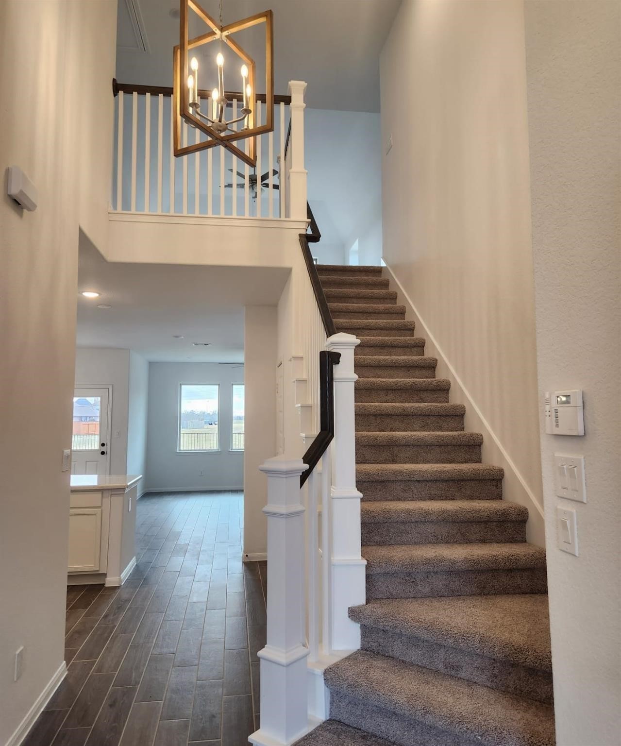 2419 Humble Way Rosenberg, TX 77471 - Photo 3 of 38 a view of entryway and hall with wooden floor