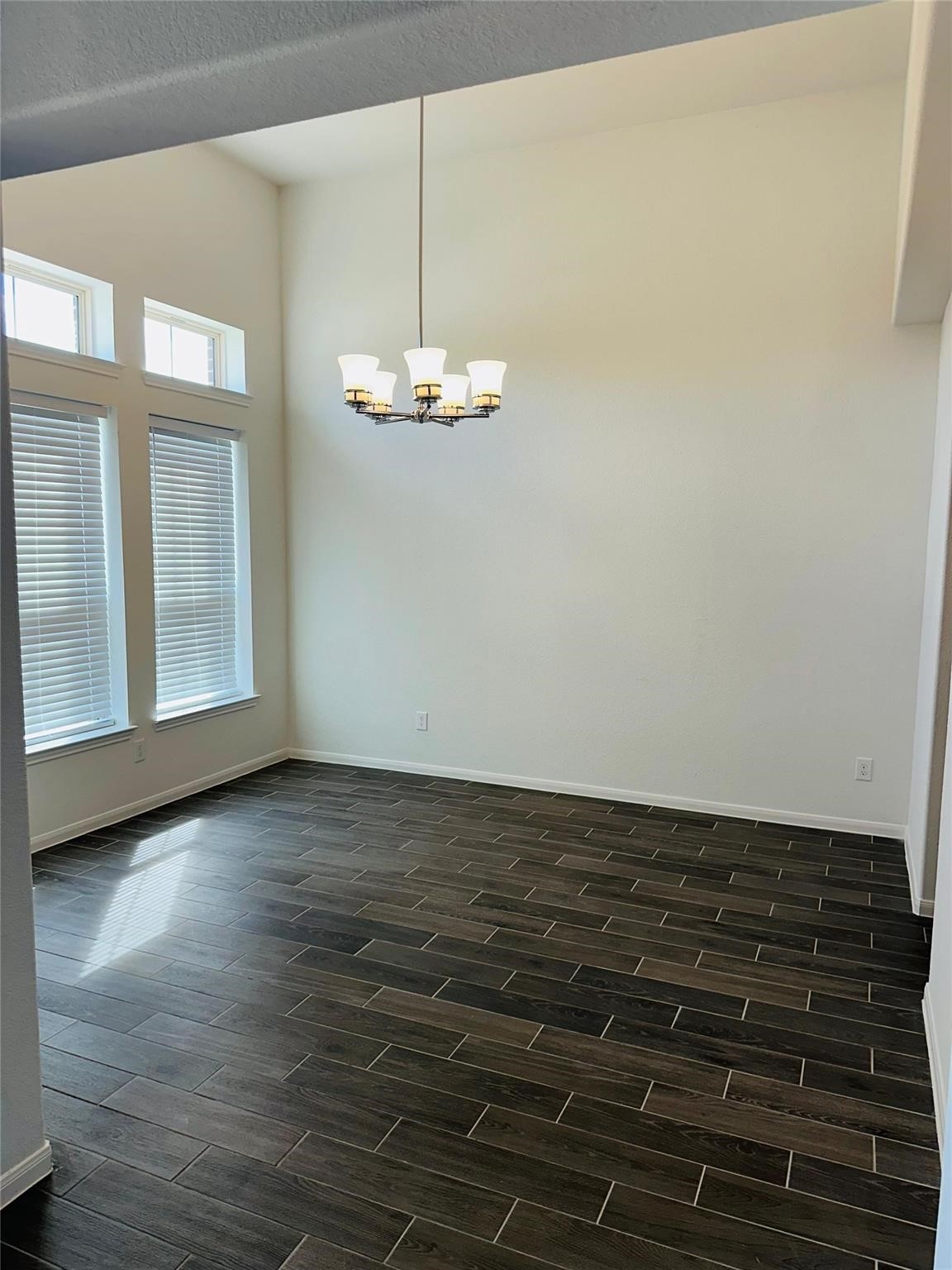 2419 Humble Way Rosenberg, TX 77471 - Photo 5 of 38 a view of empty room with wooden floor