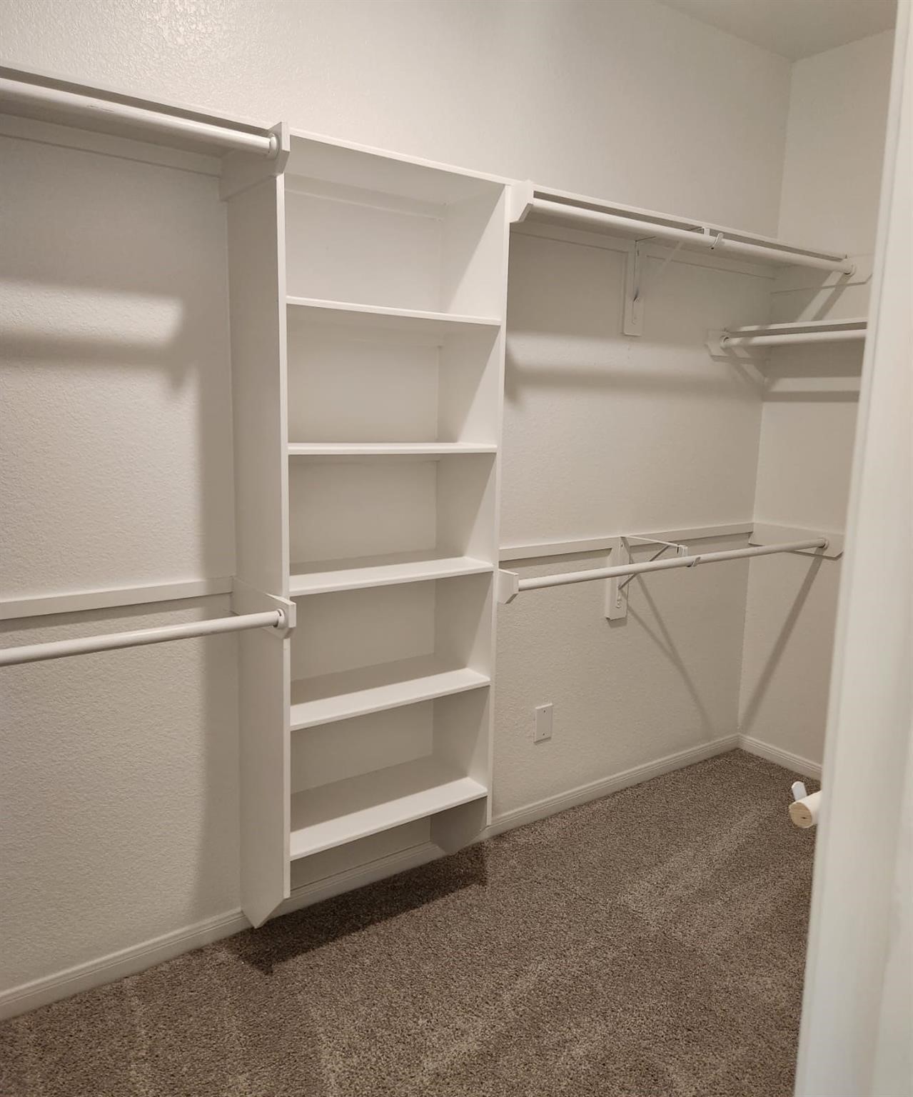 2419 Humble Way Rosenberg, TX 77471 - Photo 7 of 38 a view of an empty walk in closet