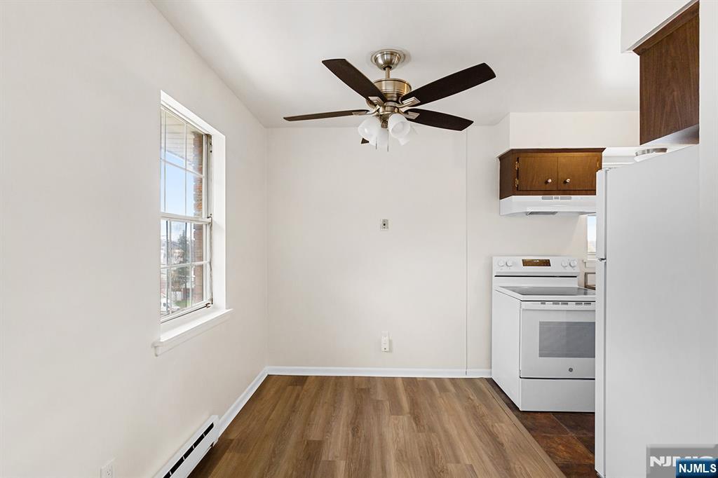 145 Arnot Street, Unit 4B Lodi, NJ 07644 - Photo 7 of 21 a view of a hallway with workspace