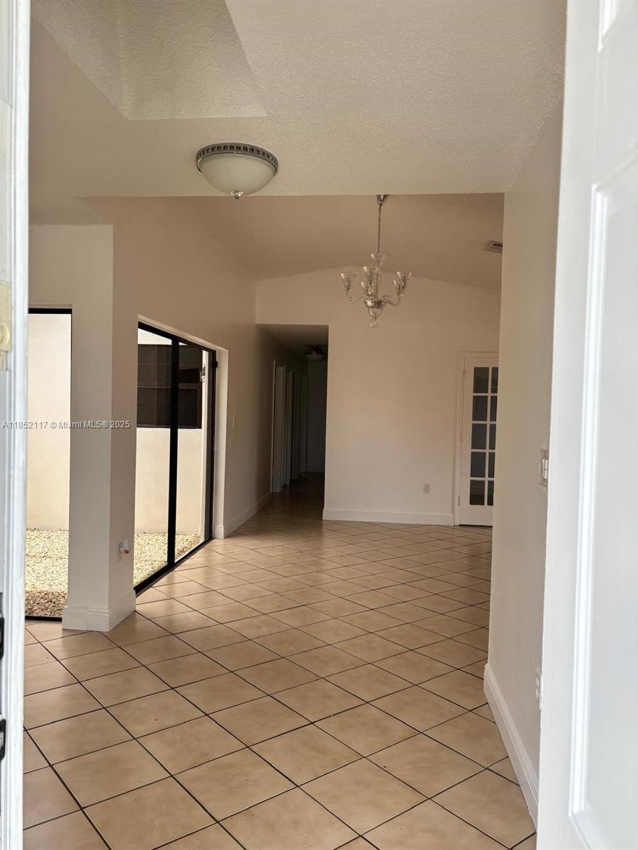5656 Southwest 149th Place Miami, FL 33193 - Photo 3 of 28 a view of a hallway