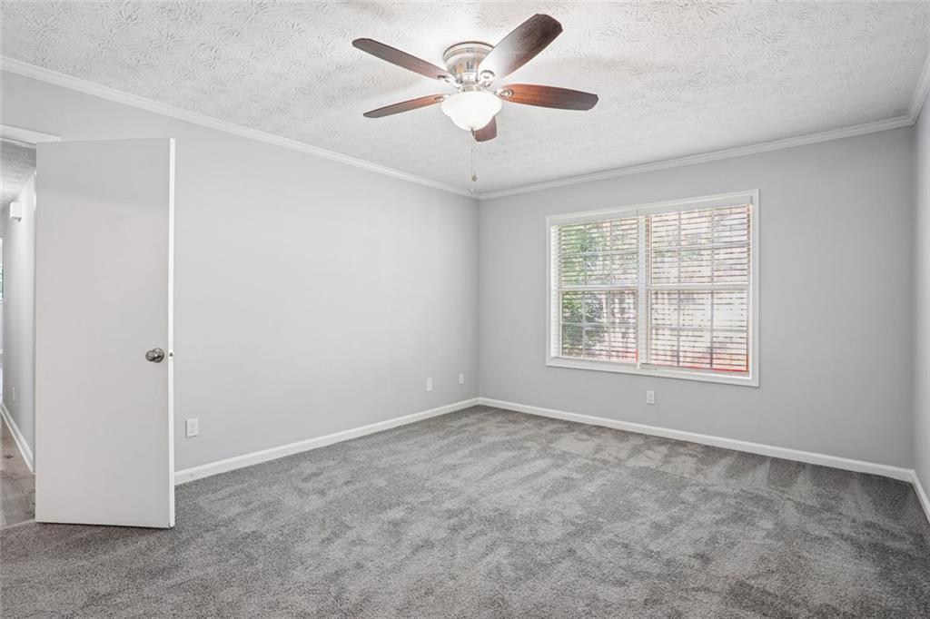 6430 Oakleaf Way Morrow, GA 30260 - Photo 12 of 23 a view of an empty room with a window