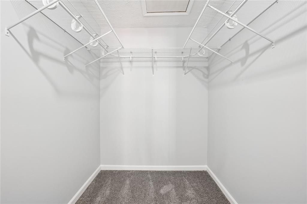 6430 Oakleaf Way Morrow, GA 30260 - Photo 14 of 23 a view of a room with racks on the wall