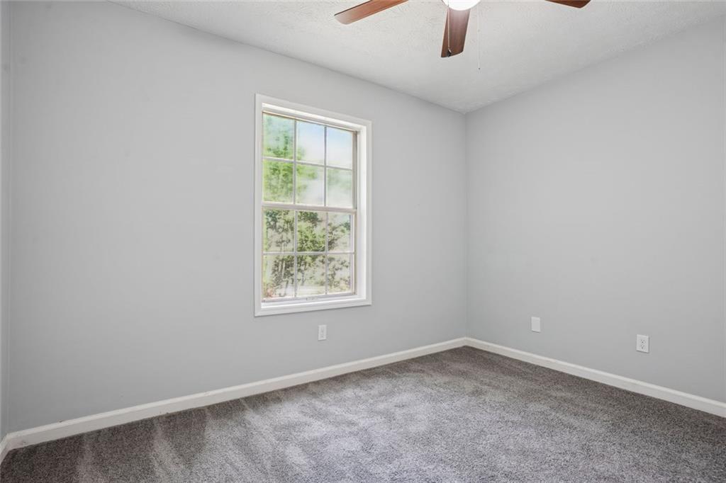 6430 Oakleaf Way Morrow, GA 30260 - Photo 21 of 23 an empty room with a window