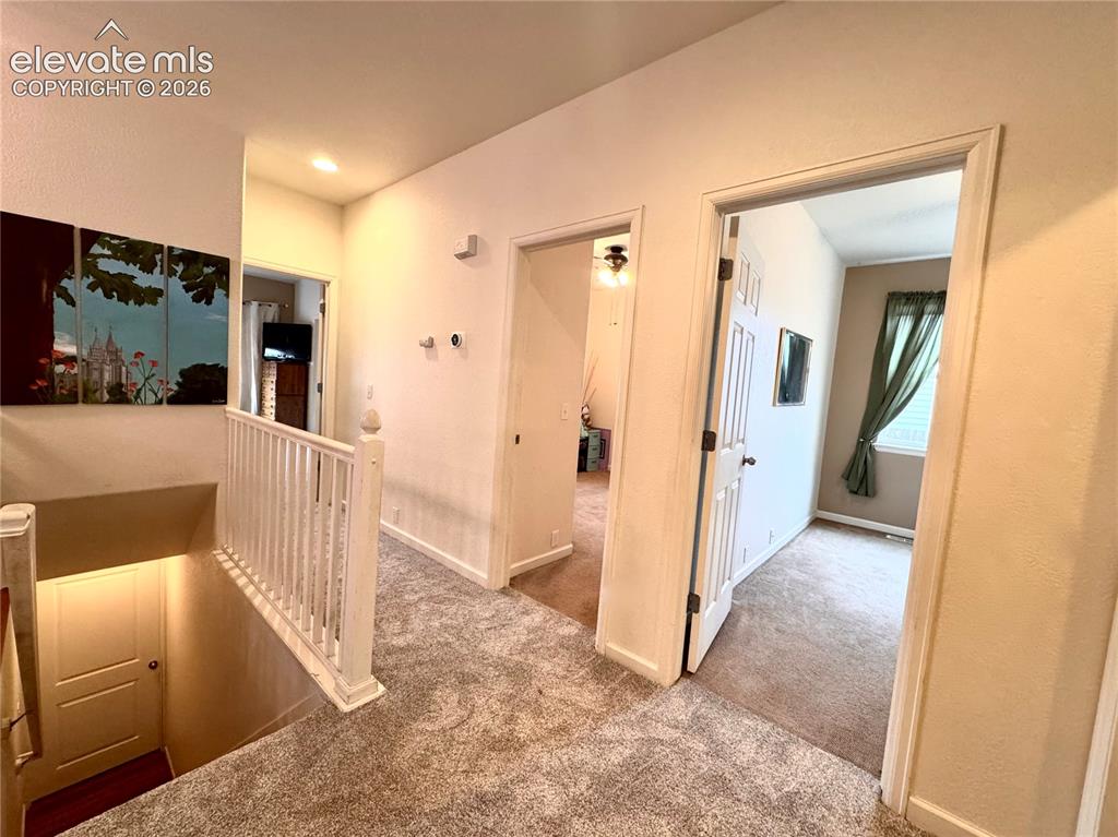 9362 St.George Road Peyton, CO 80831 - Photo 10 of 32 a view of a hallway view with staircase