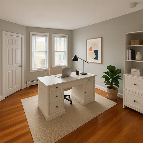 a workspace with furniture and window