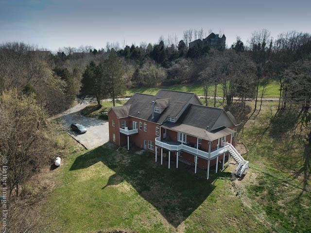 685 Bates Road Lebanon, TN 37087 - Photo 3 of 30 an aerial view of a house with mountain view