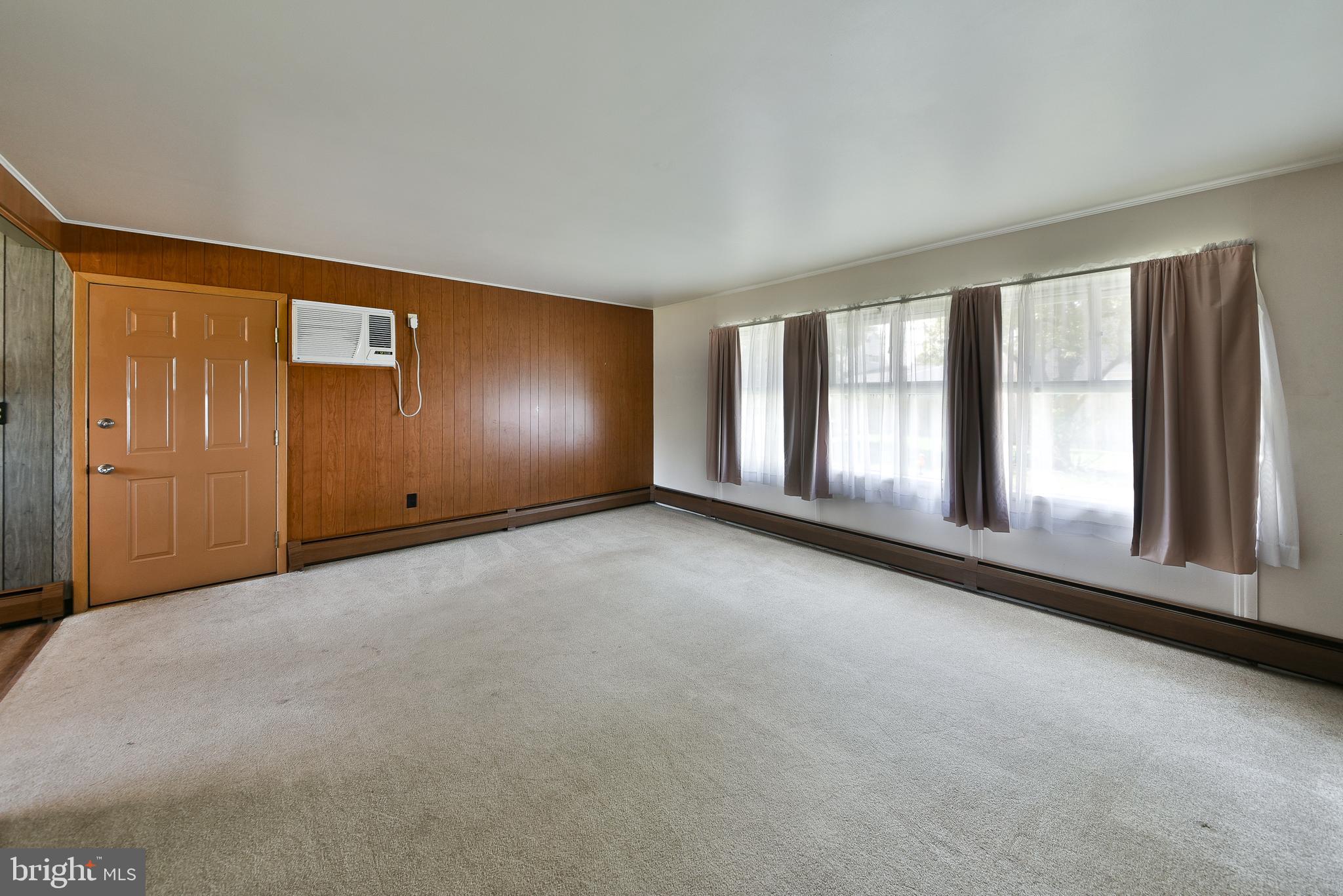 63 Ice Pond Road Levittown, PA 19057 - Photo 4 of 25 Living/Dining Area Plenty of Natural Light