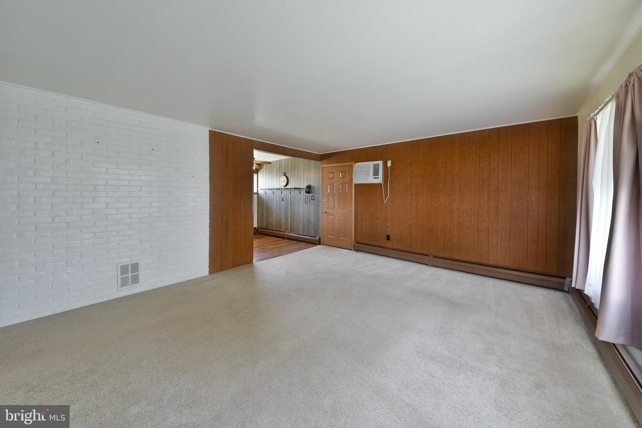 63 Ice Pond Road Levittown, PA 19057 - Photo 5 of 25 Living Room looking on to side entry door