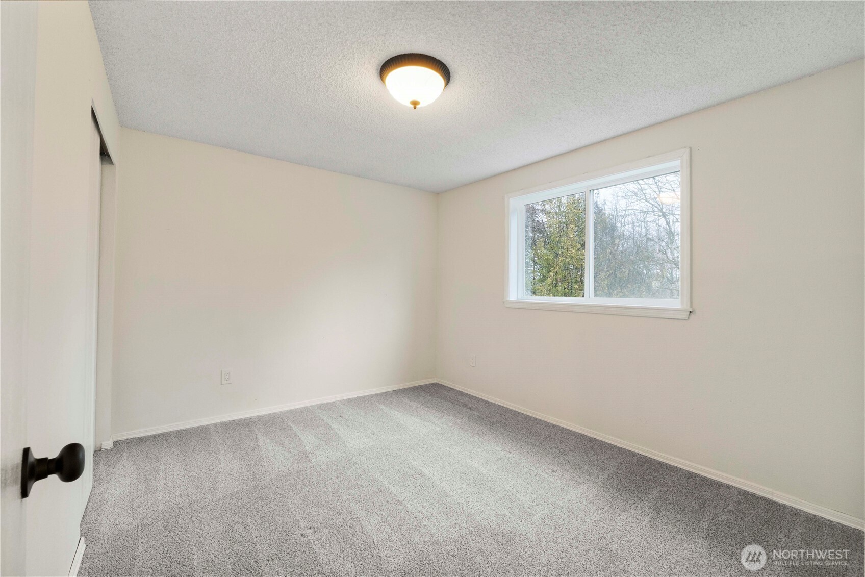 832 Torrey Street Southeast Olympia, WA 98513 - Photo 17 of 27 a view of an empty room with a window