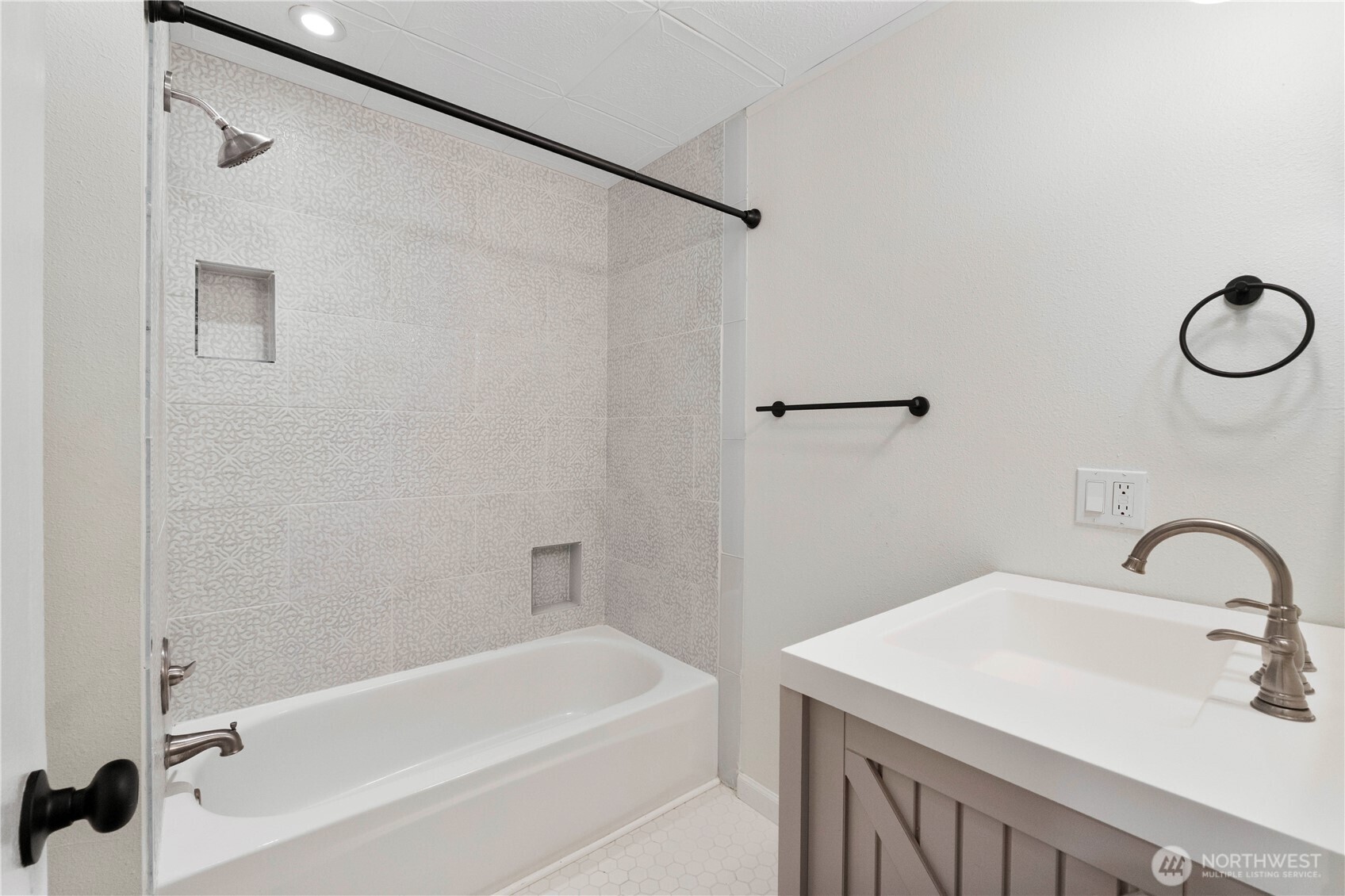 832 Torrey Street Southeast Olympia, WA 98513 - Photo 19 of 27 a bathroom with a sink and a shower