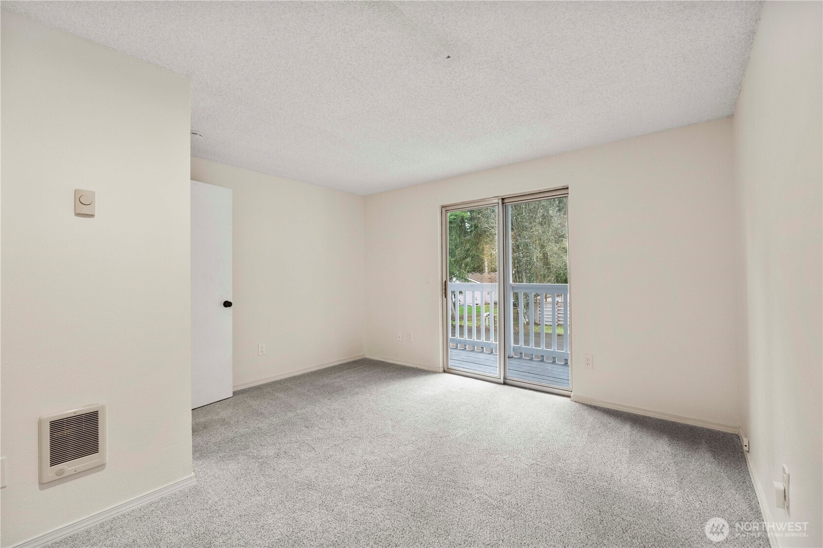 832 Torrey Street Southeast Olympia, WA 98513 - Photo 22 of 27 a view of an empty room with glass door