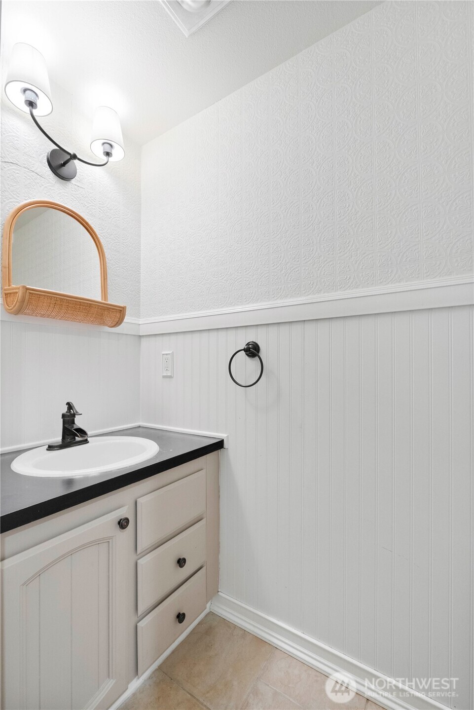 832 Torrey Street Southeast Olympia, WA 98513 - Photo 10 of 27 a bathroom with a sink and a mirror