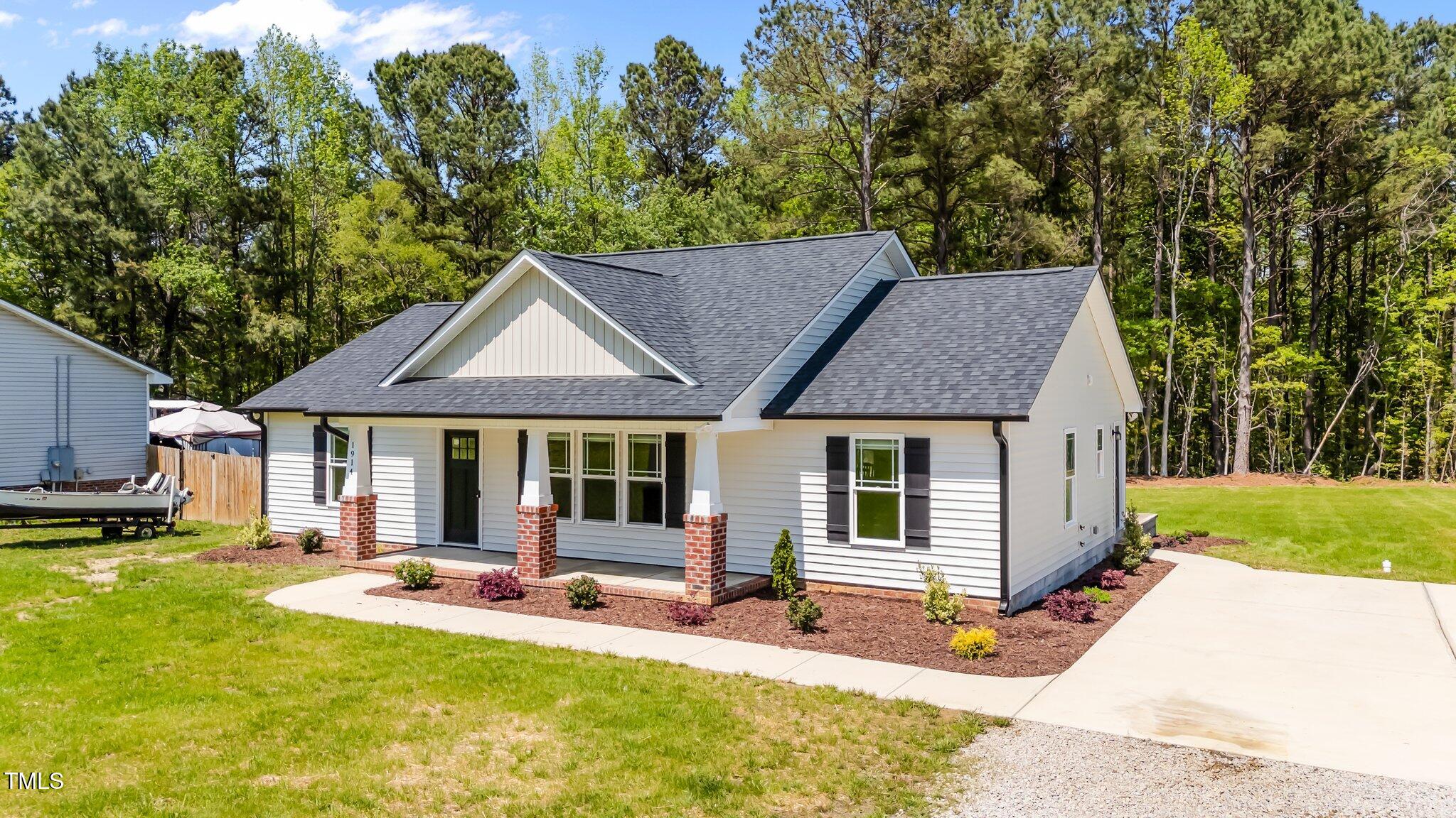 1914 Jack Road Clayton, NC 27520 - Photo 2 of 38 2-web-or-mls-dji_fly_20250414_135428_005