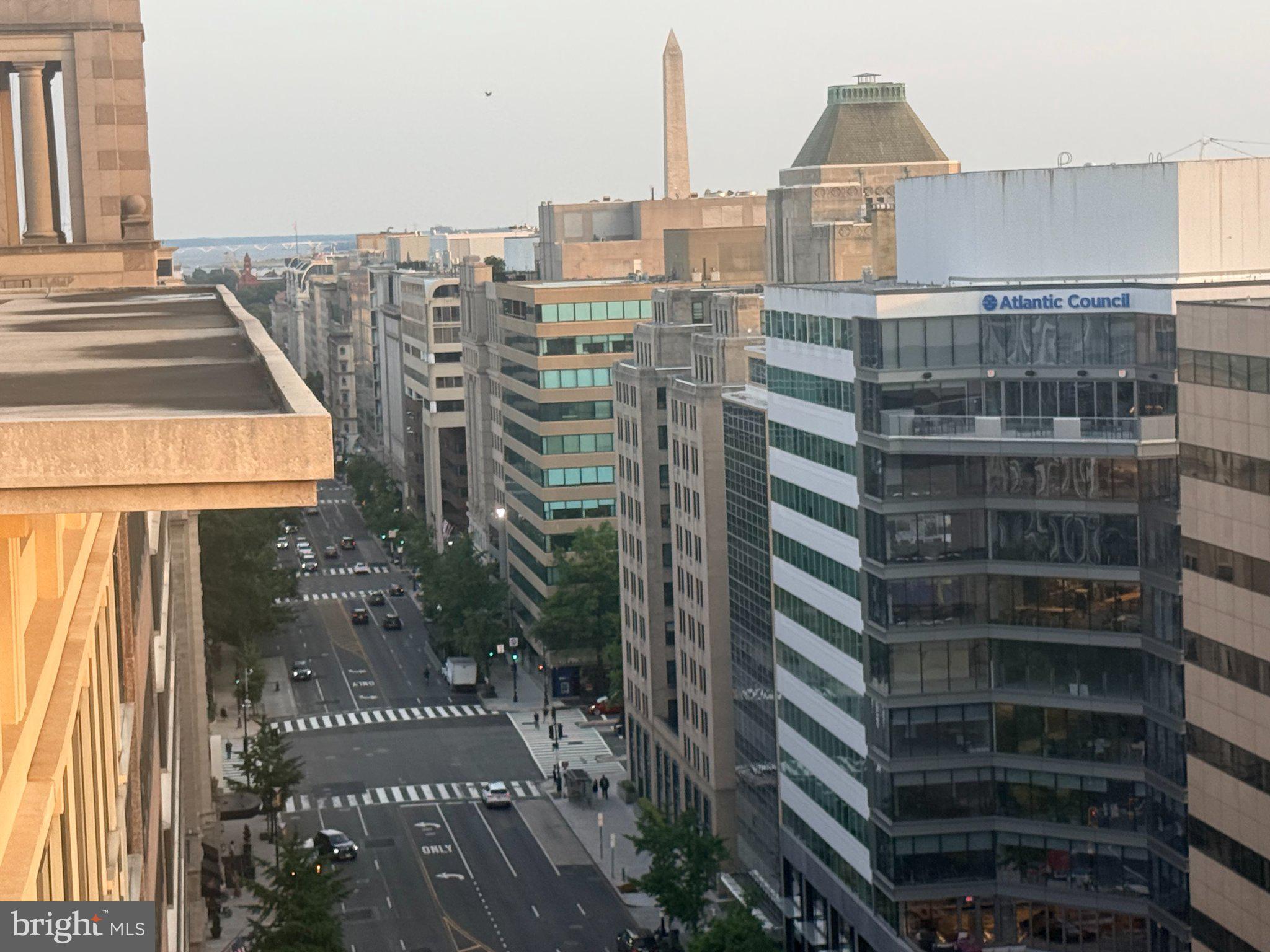 1133 14th Street Northwest, Unit 503 Washington, DC 20005 - Photo 25 of 29 Urban skyline at dawn's embrace.