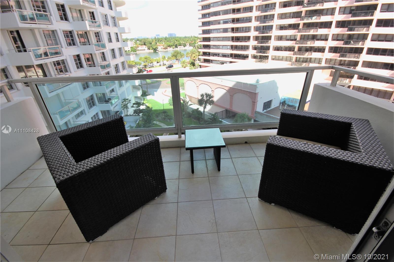 5161 Collins Avenue, Unit 711 Miami Beach, FL 33140 - Photo 21 of 67 a view of an outdoor seating area