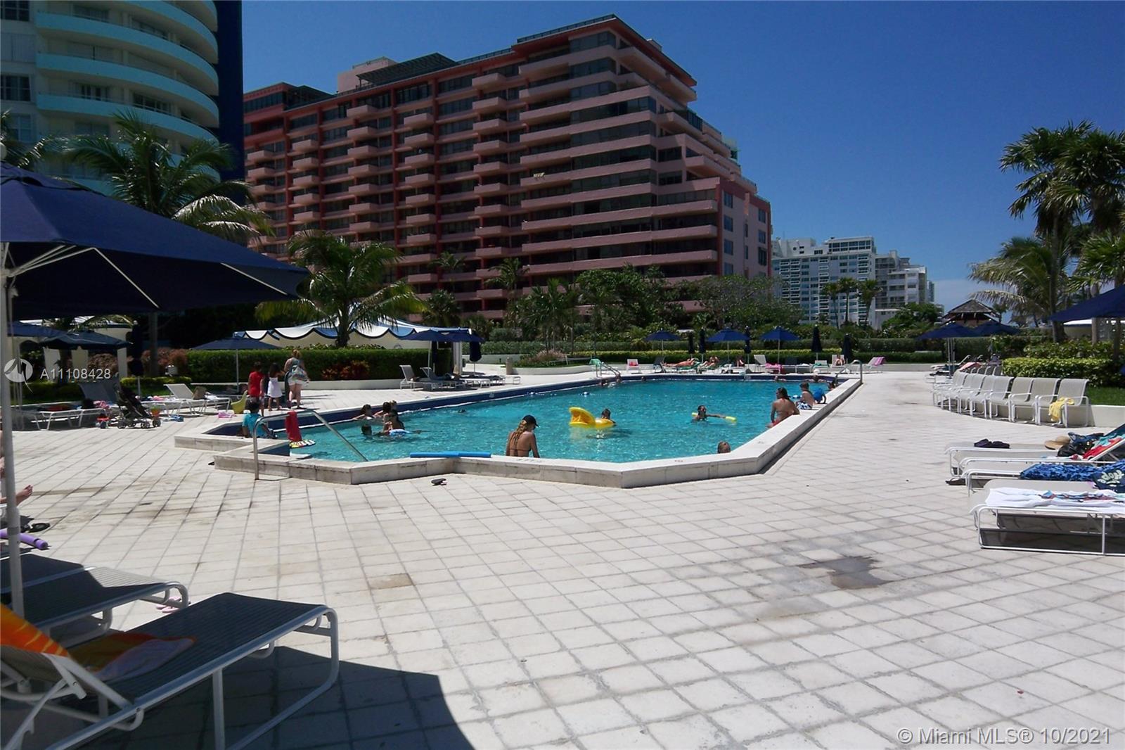 5161 Collins Avenue, Unit 711 Miami Beach, FL 33140 - Photo 26 of 67 a view of outdoor space with swimming pool and patio