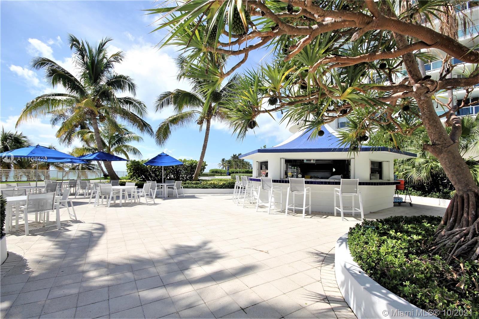 5161 Collins Avenue, Unit 711 Miami Beach, FL 33140 - Photo 33 of 67 a view of a backyard with a sitting area