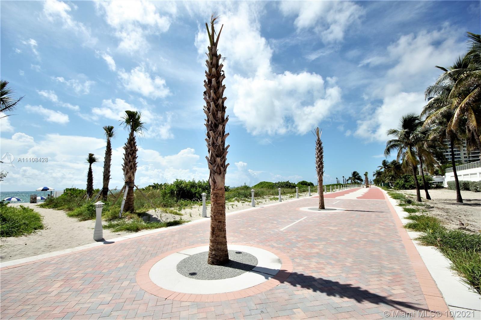 5161 Collins Avenue, Unit 711 Miami Beach, FL 33140 - Photo 65 of 67 a park with water fountain and trees