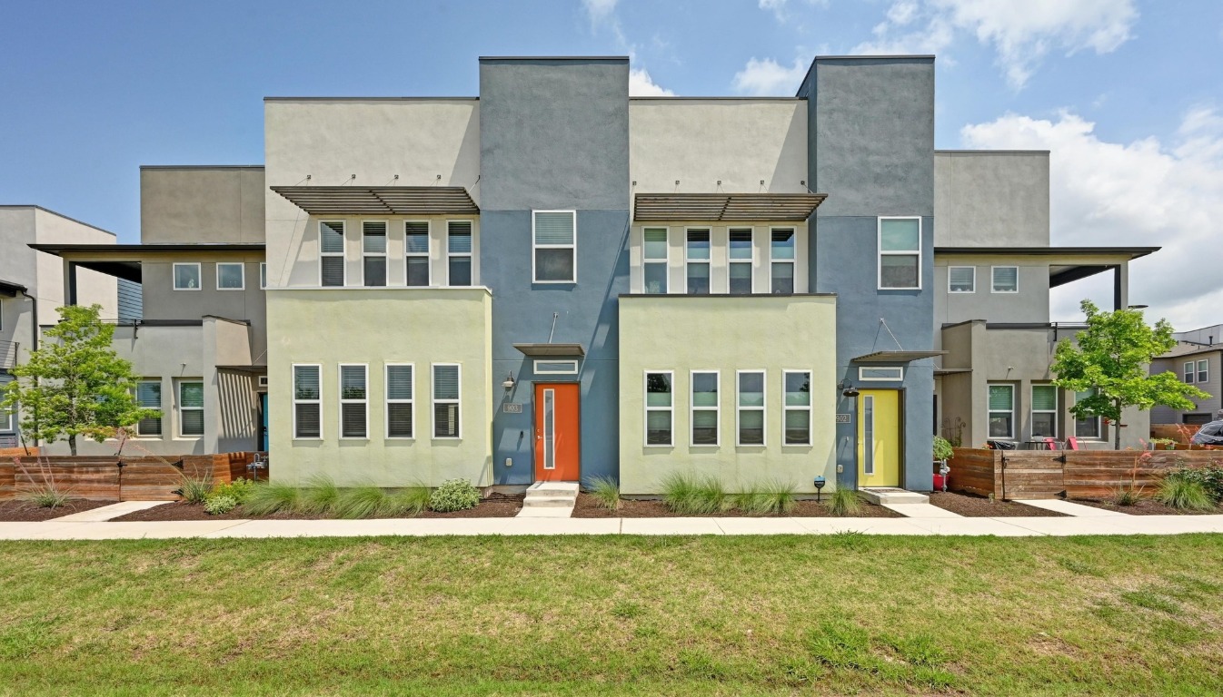 front view of a building with a yard