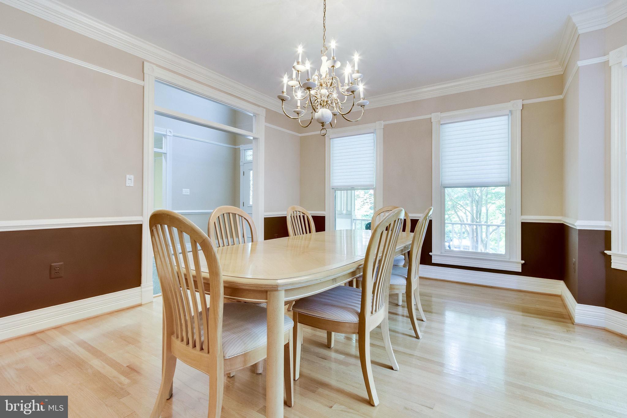 6570 Old Chesterbrook Road McLean, VA 22101 - Photo 12 of 69 Formal dining room with chair railing