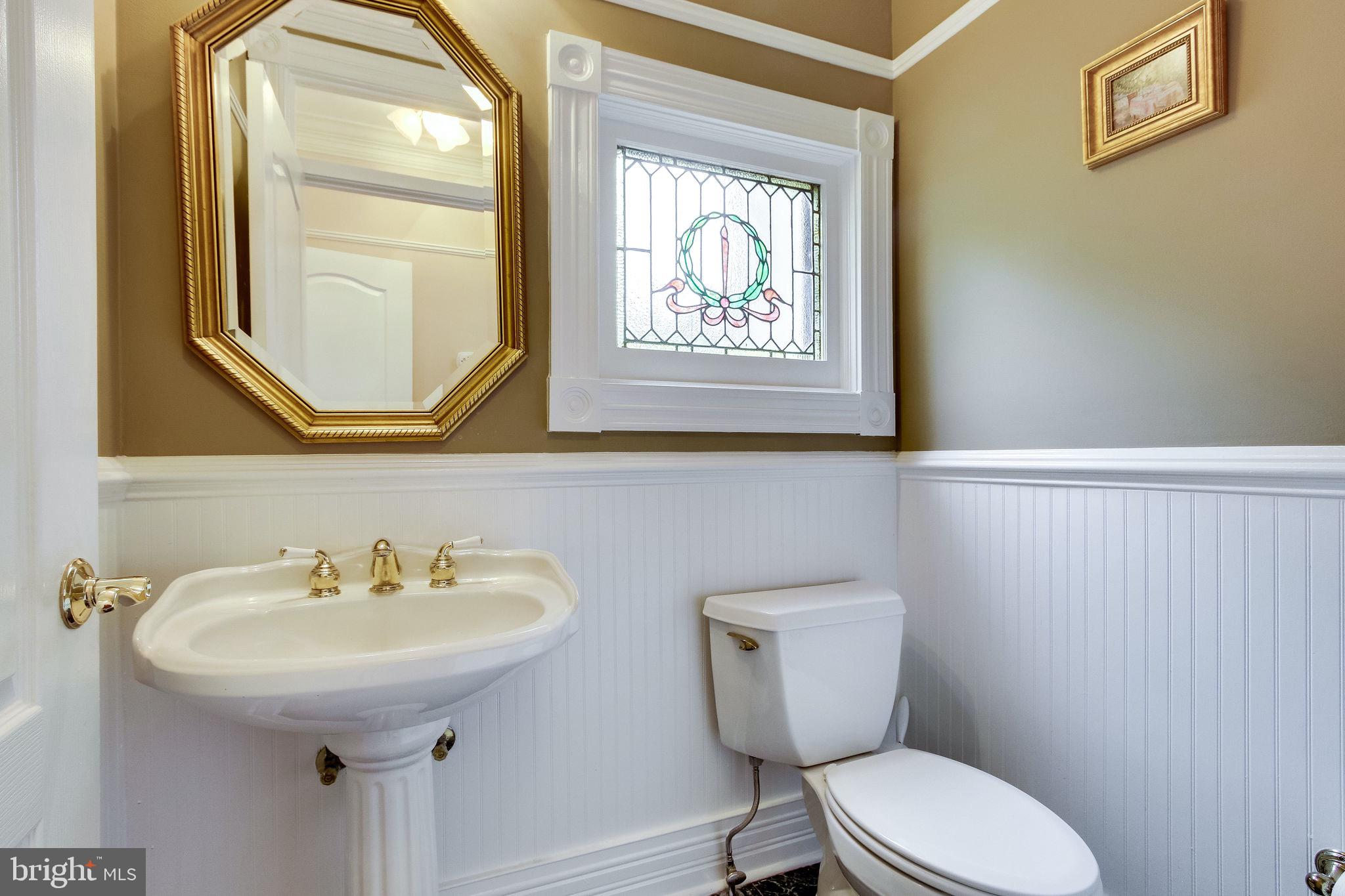6570 Old Chesterbrook Road McLean, VA 22101 - Photo 13 of 69 Powder room on main level off the dining room