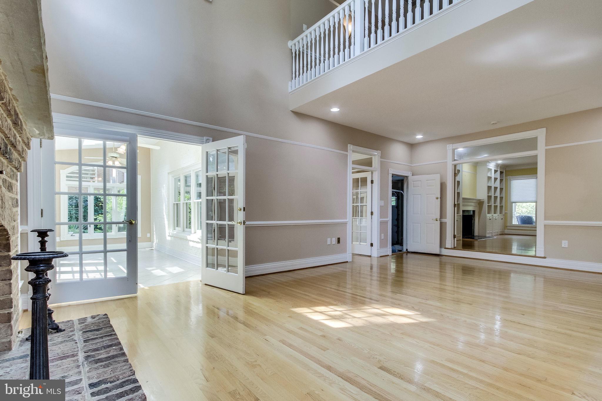 6570 Old Chesterbrook Road McLean, VA 22101 - Photo 22 of 69 Opens to sunroom w/ deck access