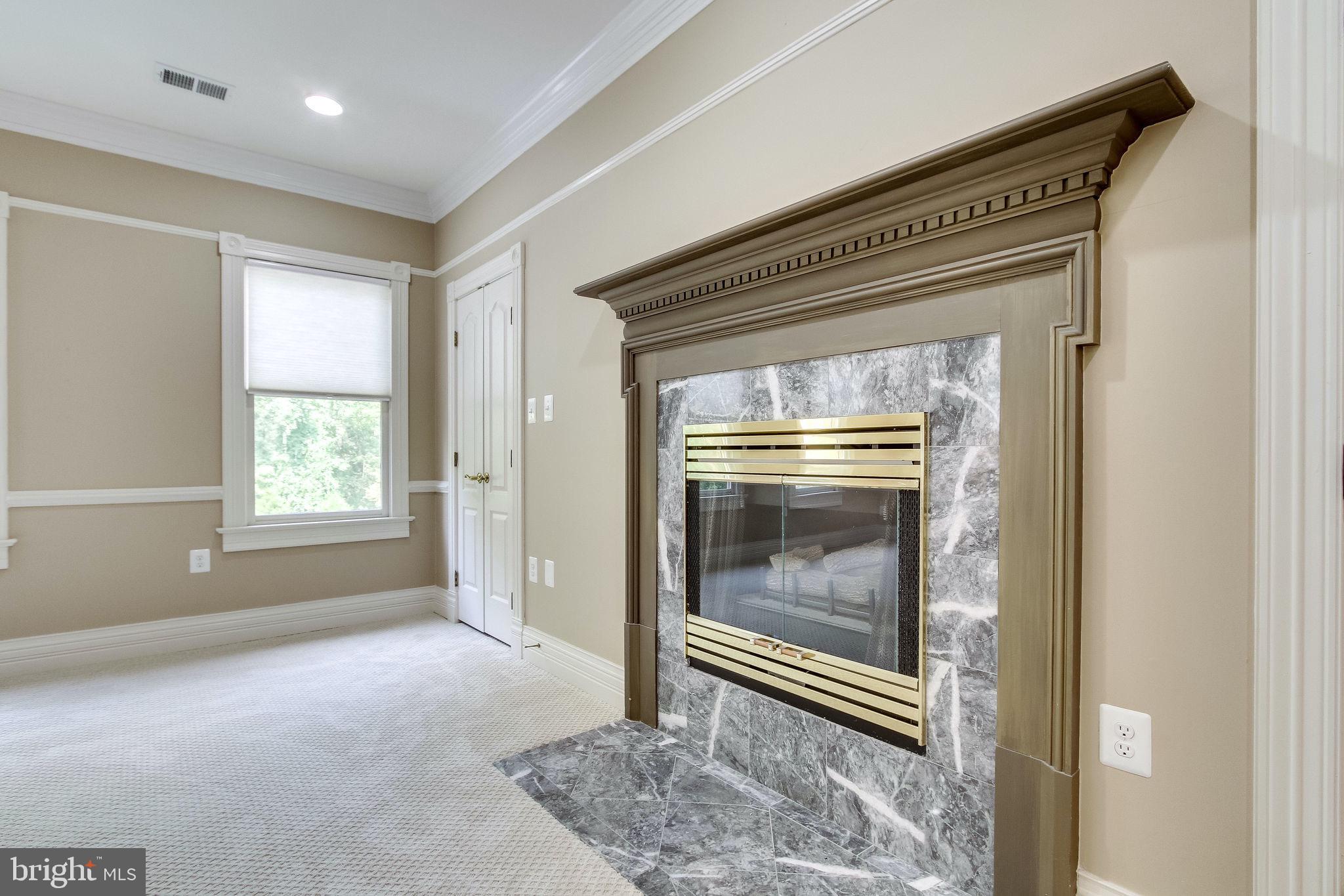 6570 Old Chesterbrook Road McLean, VA 22101 - Photo 46 of 69 Master bedroom gas fireplace perfect for fall