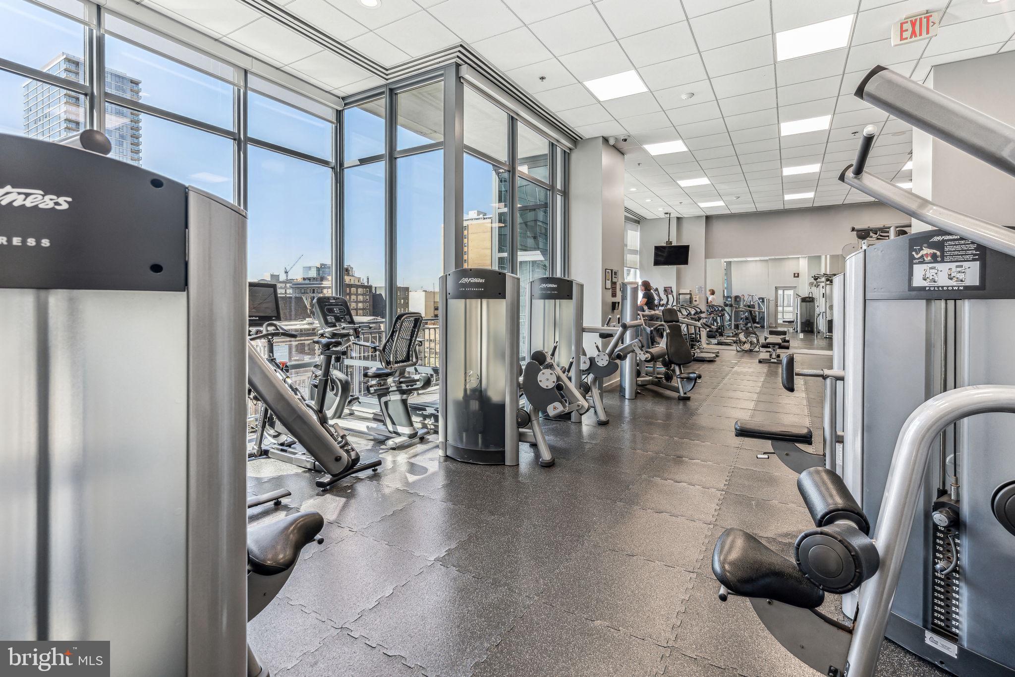 2101 Market Street, Unit 905 Philadelphia, PA 19103 - Photo 19 of 30 a view of a room with gym equipment