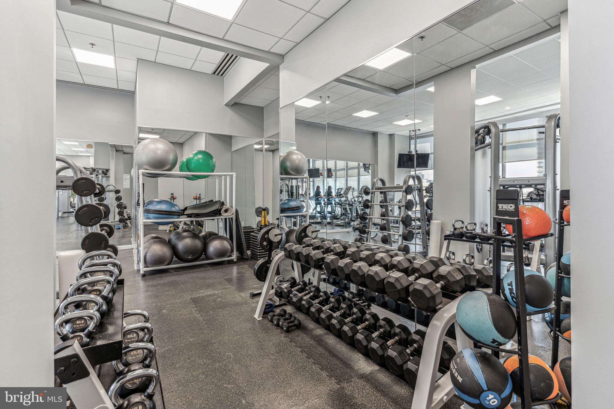 2101 Market Street, Unit 905 Philadelphia, PA 19103 - Photo 20 of 30 a view of a room with gym equipment