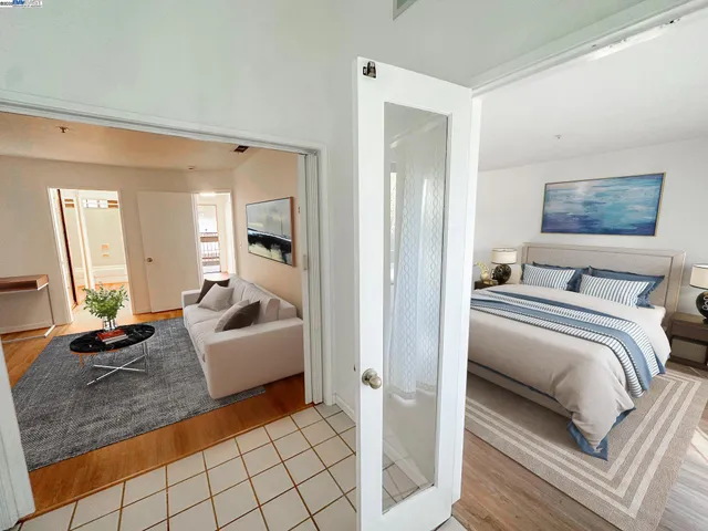 a bedroom with furniture and a couch