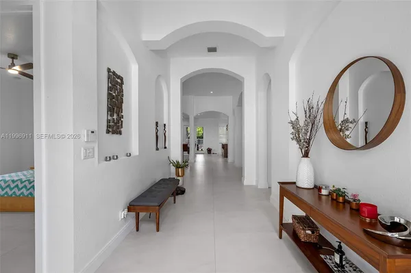 a bedroom with a bed and cabinets