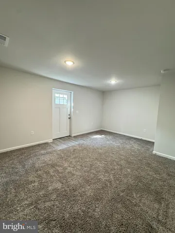 an empty room with an entryway