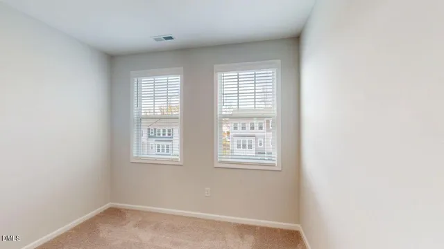 a bathroom with a bathtub shower sink vanity mirror and toilet