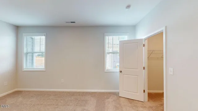 a kitchen with sink cabinets and window