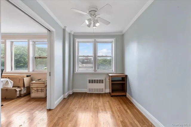 a view of kitchen with stainless steel appliances granite countertop a stove and a refrigerator