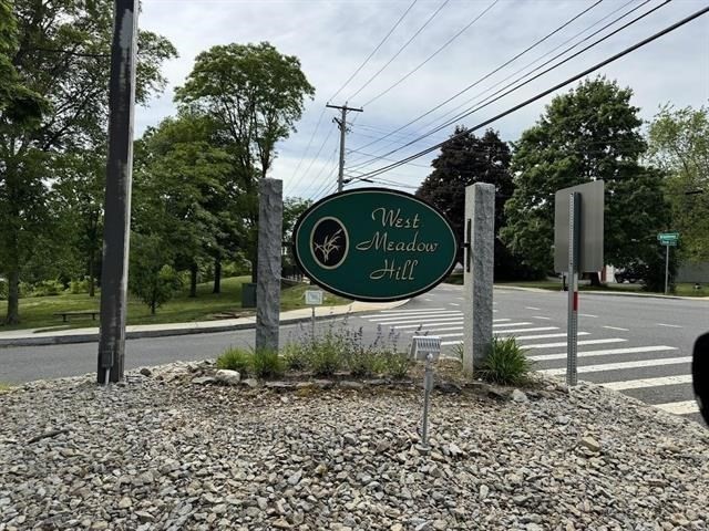 43 West Meadow Road, Unit 43 Haverhill, MA 01832 - Photo 42 of 42 a sign on the side of a road
