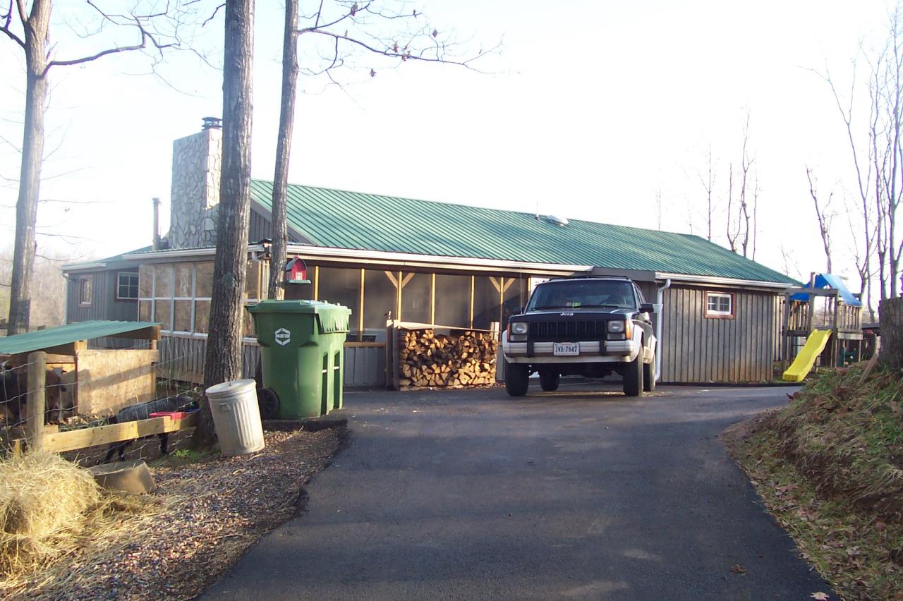 8266 Goodview Road Goodview, VA 24095 - Photo 2 of 23 a view of a car park in front of house