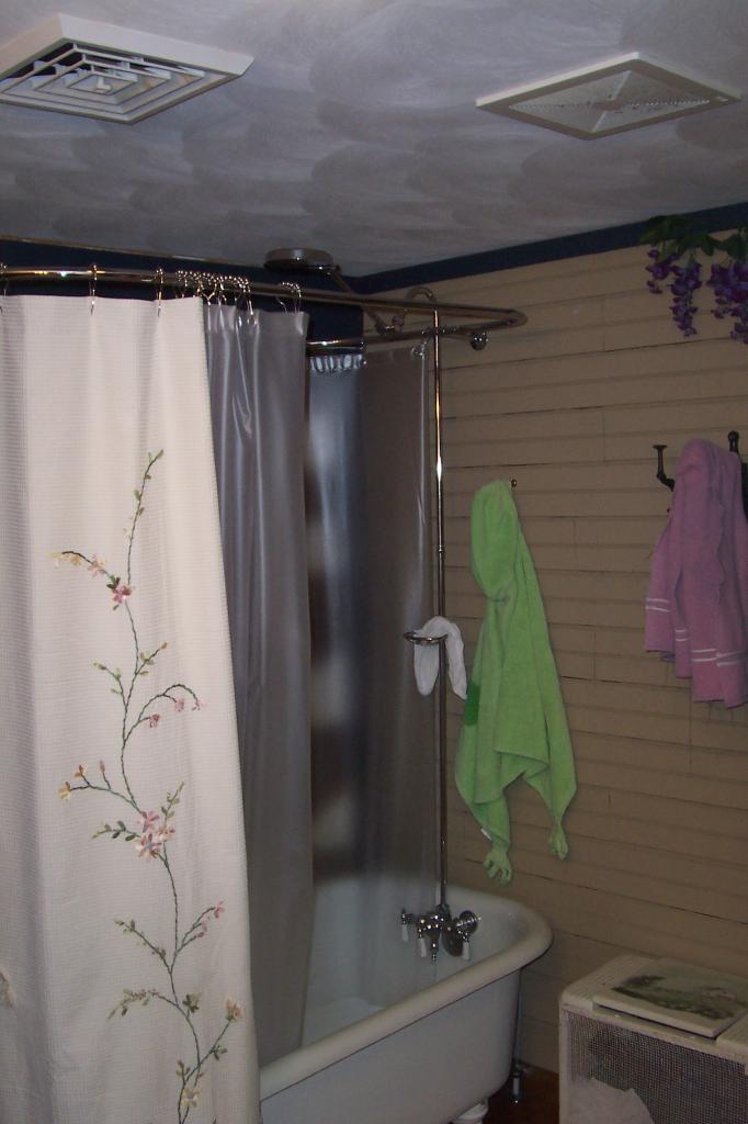 8266 Goodview Road Goodview, VA 24095 - Photo 12 of 23 a bathroom with a sink and a shower