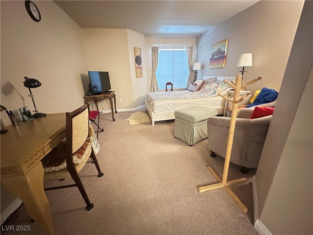 698 South Racetrack Road, Unit 322 Henderson, NV 89015 - Photo 24 of 39 Bedroom featuring carpet flooring and baseboards