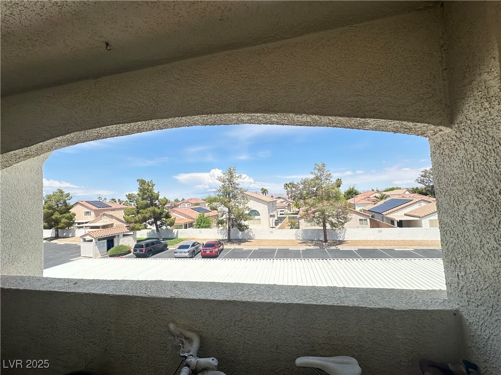 698 South Racetrack Road, Unit 322 Henderson, NV 89015 - Photo 35 of 39 View of patio / terrace featuring a balcony and a residential view