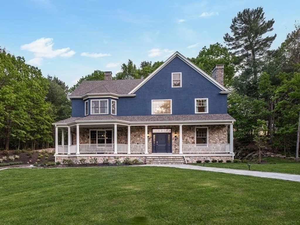 59 Crestview Road Milton, MA 02186 - Photo 2 of 42 a front view of a house with a garden