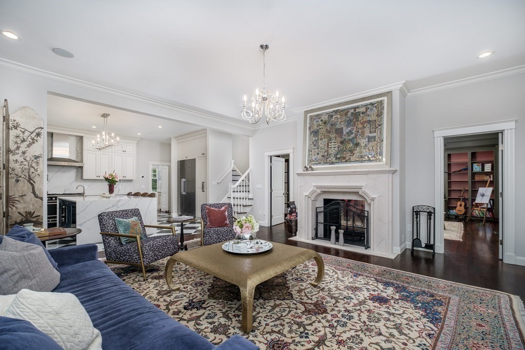 59 Crestview Road Milton, MA 02186 - Photo 10 of 42 a living room with furniture and a fireplace